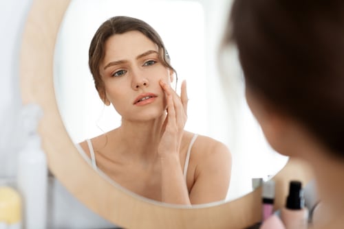 Acne,Prone,Skin,Concept.,Upset,Young,Woman,Looking,At,Mirror